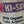 Close-up of a organic coffee bean bag with visible branding and text.