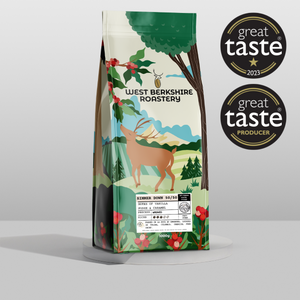 Coffee bag from West Berkshire Roastery with Great Taste awards on a gray background